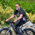 Arnold Schwarzenegger Returns to His Roots: Hollywood Icon Cycles Through Austrian Hometown